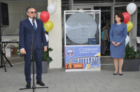 Новый арт-объект - монета с видом древнего города и музея космонавтики   