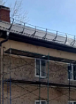 На Московской улице ремонтируют фасад дома